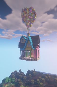 a house floating in the air with a heart shaped balloon flying over it's roof