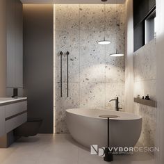 a bathroom with a large bathtub next to a sink