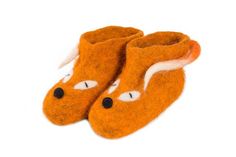 a pair of orange slippers with white and black eyes