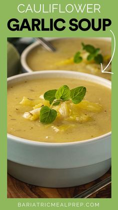 the recipe for cauliflower garlic soup is in a white bowl with green leaves on top