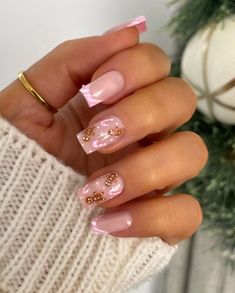 Credits: by_hannahtaylor | IG  nails, inspo, inspiration, ideas, trends, nail polish, nail art, fall, christmas, winter, tutorial, aesthetic, french nails, holiday, gold, silver, jewelry, ring, chrome, brown, long nails, almond nails, stiletto, fashion, glow, glow up, self care, sparkles, beauty, nagel design, flowers, ombre, rings, coquette, heart, hearts, glitter, fashion, shiny, cherry red, dark red, wine red, DIY, weinrot, dark, ribbon bows, shop, elegant, rich, chic, thanksgiving, that girl, pinterest app, wish list, weihnachten, herbstnägel, winternägel, outfit, autumn, herbst, visionboard, vision board, beige, holidays, gift, gift ideas, acrylic nails, gel nails, herbstnägel, gelnägel, christmas nails, november nails, thanksgiving nails, winter outfits, pink nails, gingerbread man Pink Christmas Nails Gingerbread Man, Winter Nails Long Almond, Pink French Christmas Nails, Nude Winter Nails Almond, Square Shape Christmas Nails, Gingerbread Almond Nails, Pink And Brown Christmas Nails, Christmas Nails Pink Gingerbread, New Year Nails Gold