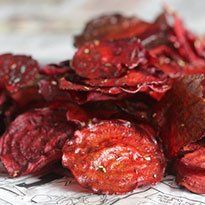 dried beets sitting on top of a piece of paper