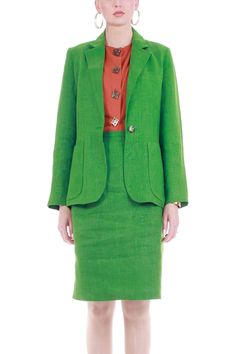 Incredible grass green pure linen 1980s vintage two-piece matching skirt suit. Chicly tailored blazer jacket with single button closure at the waist and large patch pockets, small shoulder pads, fully lined in silky green satin. The matching pencil skirt is high waisted, about or above knee length, fitted nonelastic waistline with a center back zipper and button loop closure. Fully lined in silky green satin. No stretch to either piece. This suit appears unworn but there is one small smudge near Linen Skirt Suit, Skirt Suit Set, Blazer And Skirt, High Waist Skirt, Tailored Blazer, Grass Green, Linen Skirt, Green Satin, Modern Outfits