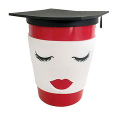 a red and white coffee cup with a black graduation cap on it's head