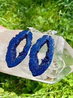 These elegant blue geode earrings are inspired by Blue Goldetone and made with resin They are lightweight so they won't bother your ears Clip on option is available. I can also make a matching necklace. Message me if interested! Please be aware that resin is heat resistant up to 135 degrees. These earrings cannot be in the hot full sun shining on them for a long time. For example, I would not wear them to the beach or leave them in a hot car. I am not responsible for earrings that have been defo Blue Geode, Geode Earrings, Sun Shining, Blue Goldstone, Boho Festival, Matching Necklaces, Earrings Photo, Hot Cars, Handmade Art