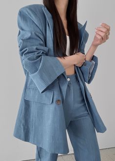 Color: Blue Midweight cotton denim fabric Oversized fit Peak lapels Padded shoulders Double front flap pockets Single illusion breast pocket Vented back Double breasted front button closure Lined 100% Cotton Dry Clean Imported The Frankie Shop, Frankie Shop, Denim Blazer, Skirt Socks, Blouse Outfit, Jeans Jumpsuit, Romper Pants, Cardigan Coat, Denim Fabric