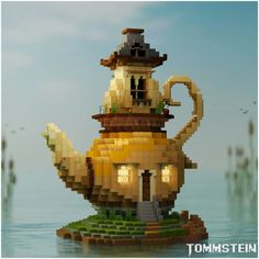 a teapot made out of legos in the water