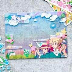 an image of two anime characters with flowers and butterflies on the back of a mouse pad