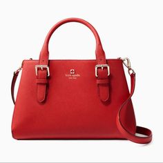 Excellent Used Condition Women’s Kate Spade Pillbox Red Cove Street Provence Satchel Handbag Purse Size 8.2"H X 11.7"W X 4.3"D Material: Crosshatched Leather - Double Handles With 4.5" Drop. - Detachable Adjustable Crossbody Strap With 21" Drop - Magnetic Closure. - Center Zip Compartment And Double Slide Pockets And Zipper Pocket. (See Photos Of Inside. 3 Total Compartments, Lots Of Space) In Fantastic Condition. No Stains Or Tears In Material. See Photo For Reference Of Bottom Of Bag. Normal Bit Of Debris On Corners Of Bottom, But Is Only Visible If You Hold Up The Bottom Of The Bag. Classic Red Bag With Branded Hardware, Red Rectangular Satchel With Branded Hardware, Classic Red Office Bags, Luxury Red Kate Spade Bag, Elegant Red Kate Spade Shoulder Bag, Kate Spade Luxury Red Bag, Kate Spade Red Formal Shoulder Bag, Classic Red Satchel With Gold-tone Hardware, Kate Spade Red Rectangular Shoulder Bag