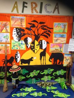 an african themed classroom display with animals and trees on it's walls, along with other decorations