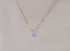 The loveliest gentle purple lavender Cape amethyst is featured on a necklace of sparkling chain, in your choice of sterling silver or 14kt gold filled, and pendant style or attached directly to the necklace chain. This delicately hued drop is ethereally beautiful and will not disappoint. The Cape amethyst necklace arrives presented in a black velveteen jewelry snapbox, ready for gifting. Necklace details: + 14mm cape amethyst faceted drop + High tensile strength 1.3mm cable chain + Spring clasp Teardrop Birthstone Necklace For Jewelry Making, Delicate Gemstone Round Pendant Jewelry, Delicate Round Pendant Gemstone Jewelry, Everyday Rose Gold Necklace With Gemstone, Delicate May Birthstone Round Pendant, Dainty 14k Gold Hypoallergenic Charm Necklaces, Everyday Rose Gold Gemstone Necklace, Fine Jewelry With Briolette Delicate Chain, Fine Jewelry With Delicate Briolette Chain