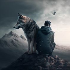 a man sitting on top of a pile of rocks next to a wolf