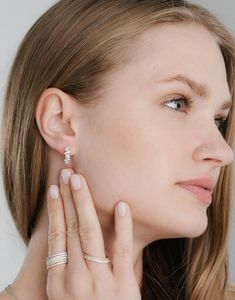 Crislu Cluster Petite Hoops - Style Code: 9011010E00CZ - Carat total weight: 1.0 - .925 sterling silver finished in pure platinum - 0.6" long with 0.38" diameter - Authorized Crislu Retailer - FREE PRIORITY SHIPPING on orders over $100! Hypoallergenic Round Cut Sterling Silver Jewelry, Everyday White Gold Jewelry With Prong Setting, Everyday White Jewelry With Prong Setting, Hypoallergenic Sterling Silver Jewelry With Round Cut, Hypoallergenic Sterling Silver Jewelry, Diamond White Sterling Silver Huggie Earrings With Halo Design, Modern Silver Jewelry With Halo Design, White Huggie Jewelry With Diamond Accents, Classic Rose Gold Sterling Silver Huggie Earrings