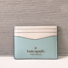 Nwt Kate Spade Slim Card Case White Rectangular Kate Spade Wallet, Trendy White Rectangular Card Holder, Trendy Blue Card Holder With Card Slots, Classic White Card Holder With Card Slots, White Bifold Card Holder With Interior Slots, White Rfid Blocking Card Holder For Daily Use, Kate Spade Blue Rectangular Wallet, Trendy Kate Spade Wallet With Card Slots, Trendy Kate Spade Wallets With Card Slots