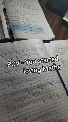 an open book sitting on top of a desk next to a pen and paper with the words pov - you started loving maths