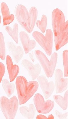 pink and red hearts are arranged in the shape of heart shapes on a white background