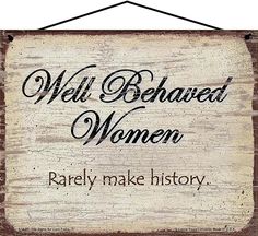 a wooden sign that says well behaved women