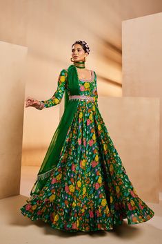 Featuring a ruffle Anarkali in an eclectic hand-painted printed floral pattern. It features a hand-embroidered neckline and belt. The belt features colourful stone drops and the dupatta is accentuated with metallic cutdana fringes.From Aneesh Agarwaal's Seher collection.DELIVERY TIMEPlease allow 8-12 weeks for your outfit to arrive.FABRIC DETAILSChinon, OrganzaProfessional cleaning only. Bollywood Style Party Anarkali Set With Digital Print, Floor-length Digital Print Dupatta For Party, Party Floor-length Digital Print Dupatta, Anarkali Georgette Lehenga With Digital Print, Bollywood Style Georgette Anarkali Set With Digital Print, Anarkali Lehenga With Digital Print, Party Anarkali Set With Printed Motifs In Traditional Drape, Digital Print Anarkali Set For Party, Anarkali Sharara With Digital Print For Party