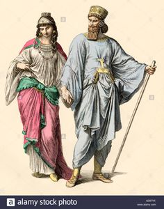 two men in ancient clothing, one with a spear and the other wearing a headdress