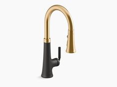 the kitchen faucet is shown in gold and black, with an angled spout