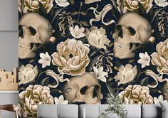 a living room filled with furniture and a large wallpaper covered in skulls and flowers