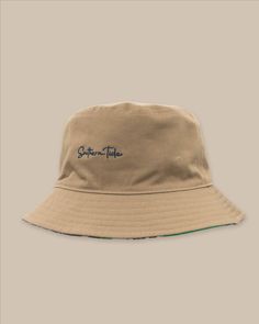 The front view of the Southern Tide Beach Blooms Bucket Hat by Southern Tide - Khaki Beige Cotton Bucket Hat With Short Brim, Khaki Cotton Sun Hat With Curved Brim, Khaki Cotton Bucket Hat With Short Brim, Khaki Brimmed Cotton Sun Hat, Khaki Cotton Bucket Hat With Curved Brim, Khaki Cotton Brimmed Sun Hat, Khaki Brimmed Cotton Bucket Hat, Casual Beige Canvas Bucket Hat, Khaki Cotton Wide Brim Bucket Hat