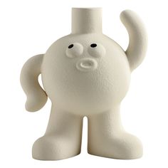 a white plastic toy with a black nose and eyes on it's head, standing in front of a white background