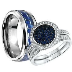 two wedding rings with blue and white diamonds