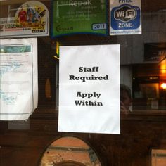 a sign that is on the side of a window saying staff required apply whinen