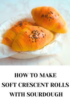 two croissant rolls on a plate with the words how to make soft crescent rolls with sourdough