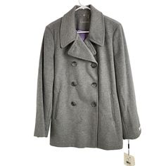 This Elegant Calvin Klein Peacoat In Size 16p Is A Perfect Blend Of Wool And Silk. Designed For Women, It Features A Double-Breasted Design In A Sophisticated Grey Color. Comes Nwt. Brand: Calvin Klein Color: Grey Size: 16p Style: Peacoat For: Women Material: Wool Silk Blend Condition: New With Tags (Nwt) Features: Retail $250 Satin Lined Extra Button Collared Hand Pockets Peacoat Fall Winter Made In China Dry Clean Size: Womens 16p Hand Measurements: Waist 42 In / 107 Cm Pit To Pit 22.5 In / 57 Pea Coats Women, Hand Measurements, Peacoats, Grey Coat, Wool Peacoat, Double Breasted Coat, Calvin Klein Woman, Distressed Black Jeans, Detachable Hood