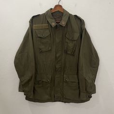 [DESCRIPTION] Please read the description first before buy my items‼️‼️ Vintage Military 1 Star Multipocket Jacket (please refer the actual measurements given and compare it with best fitting clothes,by using the size on tag is not always accurate) All in good condition [MATERIAL] Cotton [MEASUREMENT] Measurement:  armpit to armpit : 21 inches  Back collar to bottom : 29 inches Sleeve length from under armpit to end of cuff : 20 inches [CONDITION] - All in good condition  - Kindly please refer p Khaki Military Outerwear With Multiple Pockets, Vintage Military Uniforms, Green Military Outerwear With Patch Pockets, Vintage Military Jacket, Camouflage Military Jacket, Summer Sports, Vintage Military, Mens Jackets, Favorite Outfit