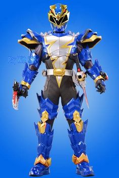 a blue and gold robot suit standing in front of a blue background