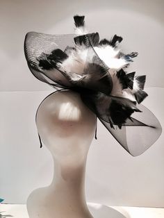 Black Fascinator- Large Brim- Breeders Cup- Wedding- White and Black Headpiece- Coque Feather- Cocktail Hat -Costume Party- Derby- Kentucky Derby- Horse Races Hello, Have fun walking into your next party/event wearing this big bright stunning hair accessory. It will definitely be a head turner! This black and white feather fascinator is about 20 inches round. It has black and white tipped feathers scattered throughout. It is attached to a skinny adjustable headband that is wrapped in satin and i Evening Feather Hat Headpiece, Evening Fascinator With Feather Trim, Feather Trim Mini Hats For Kentucky Derby Evening, Evening Feathered Hat Headpiece, Spring Formal Headpiece With Feathers, Evening Hat With Feathers, Kentucky Derby Evening Mini Hat With Feather Trim, Evening Mini Hat With Feathers And Short Brim, Adjustable Evening Hat With Feather Trim