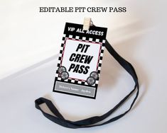 a black and white tag that says pit crew pass