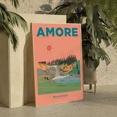 a book sitting on top of a table next to a potted plant and wall