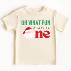 Celebrate your little one's special day with our Oh What Fun It Is To Be One 1st Birthday Shirt! Perfect for a Christmas-themed first birthday party, this festive shirt adds a joyful touch to your celebration. Designed for comfort and style, it's the ideal choice for a cake smash photo session. Make your child's first birthday unforgettable with this charming Christmas Oh What Fun First Birthday Cake Smash Outfit. Grab yours today and capture the magic of the season and the joy of turning one! + Christmas Theme First Birthday, First Birthday Christmas Theme, Christmas 1st Birthday, 1st Birthday Shirt, First Birthday Cake Smash, 1st Birthday Shirts, Oh What Fun, First Birthday Cake, Turning One