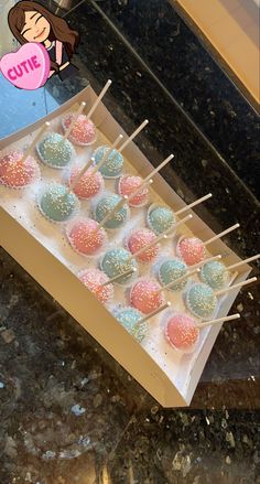 there are many cake pops in the box