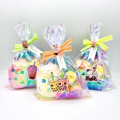 three bags filled with different types of treats