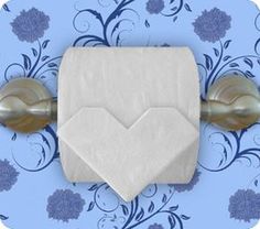 a white envelope on a blue floral background