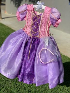 Rapunzel dress up dress. Great for dress up, play or costume Rapunzel Dress Up, Rapunzel Birthday, Rapunzel Birthday Party, Rapunzel Dress, Girl Princess Dress, Dress Up Outfits, From Santa, Rapunzel, Princess Dress