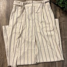 Cream Color Pin Striped Pants With Flared Leg Size 8 H&m Bottoms With Pockets For Day Out, H&m White Wide Leg Pants, H&m High Waist Bottoms For Day Out, Chic H&m Bottoms With Pockets, Chic Ankle-length Bottoms By H&m, H&m Wide Leg Pants For Spring Workwear, H&m High-waisted Pants With Pockets, H&m Wide Leg Pants For Spring, H&m Straight Pants For Summer