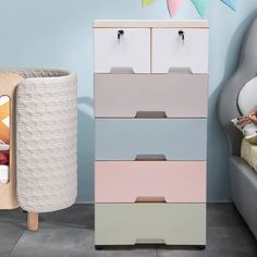 a child's room with a dresser and bed