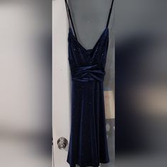 Dark Blue Mid Flare Dress. It Has Small Glitter Particles All Around. Spaghetti Traps Are Adjustable And The Fabric Is Like Suede. Blue Sleeveless Glitter Dress, Sleeveless Blue Glitter Dress, Blue Glitter Dress For Date Night, Blue Glitter Mini Dress For Evening, Flare Dress, Colorful Dresses, Spaghetti, Dark Blue, Midi Dress