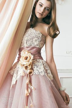 a beautiful young woman in a strapless dress