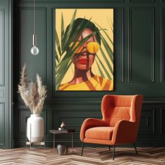 a living room with green walls and an orange chair in front of a painting on the wall