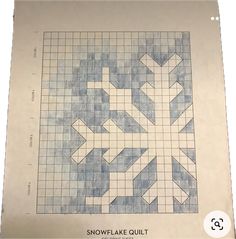 the snowflake quilt pattern is shown on a piece of paper that has been cut into squares