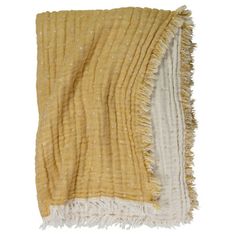 a yellow and white throw with fringes on it's edges, against a white background