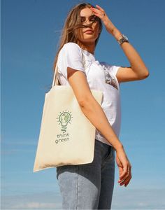 Think Green   New for 2024 Say no to plastic bags and yes to sustainably-sourced organic cotton tote bags! Look good whilst doing good with this gorgeous reusable shopper. Also makes the perfect pressie for lucky friends! At Heikō Clothing we're committed to treating both animals and the planet with compassion and we ensure that all of our products are vegan approved. Product details: * 100% organic certified cotton Tote bag * Professionally printed using environmentally-friendly dyes * Ethicall Organic Natural Bags With Eco-friendly Ink, Organic Eco-friendly Natural Color Bags, Eco-friendly Canvas Bag For Daily Use, Everyday Organic Recyclable Canvas Bag, Eco-friendly Organic Cotton Canvas Bag For Everyday Use, Eco-friendly Recyclable Canvas Tote Bag, Eco-friendly Reusable Natural Canvas Bag, Organic Recyclable Canvas Tote Bag, Organic Style Recyclable Canvas Tote Bag