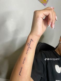 a person with a tattoo on their arm